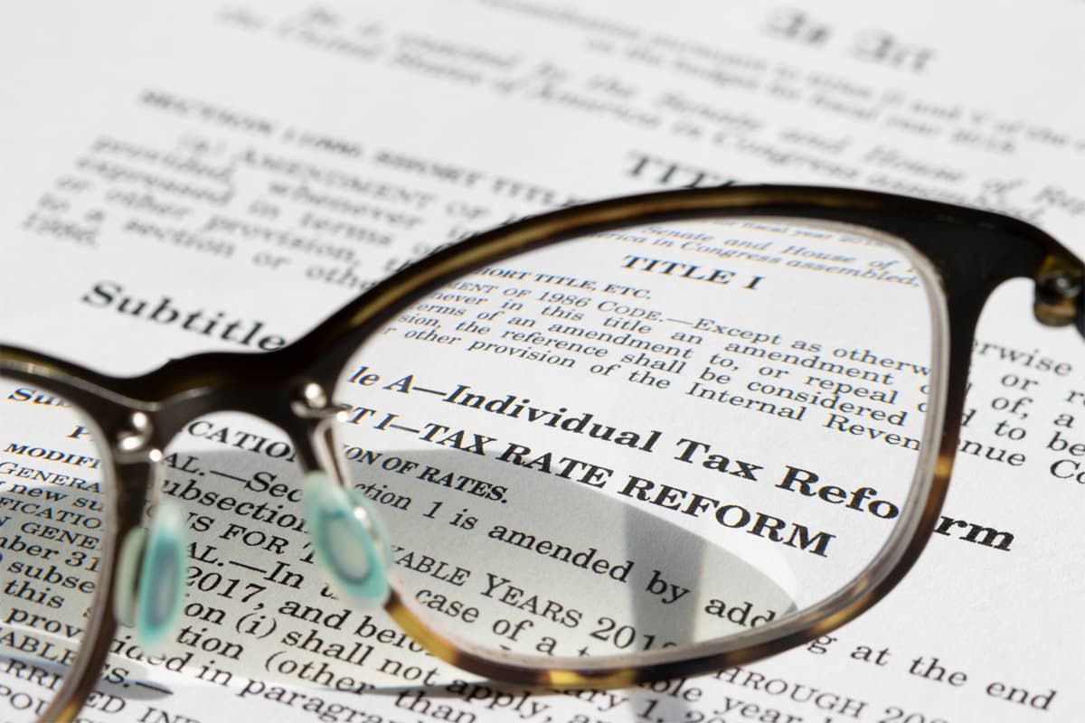 glasses over tax reform document